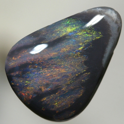 SOLID BLACK OPAL Red and copper fire moves between black opal